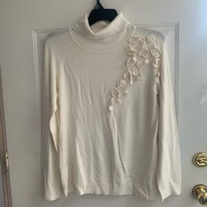 Elegant Cream Sweater with Floral Detailing
